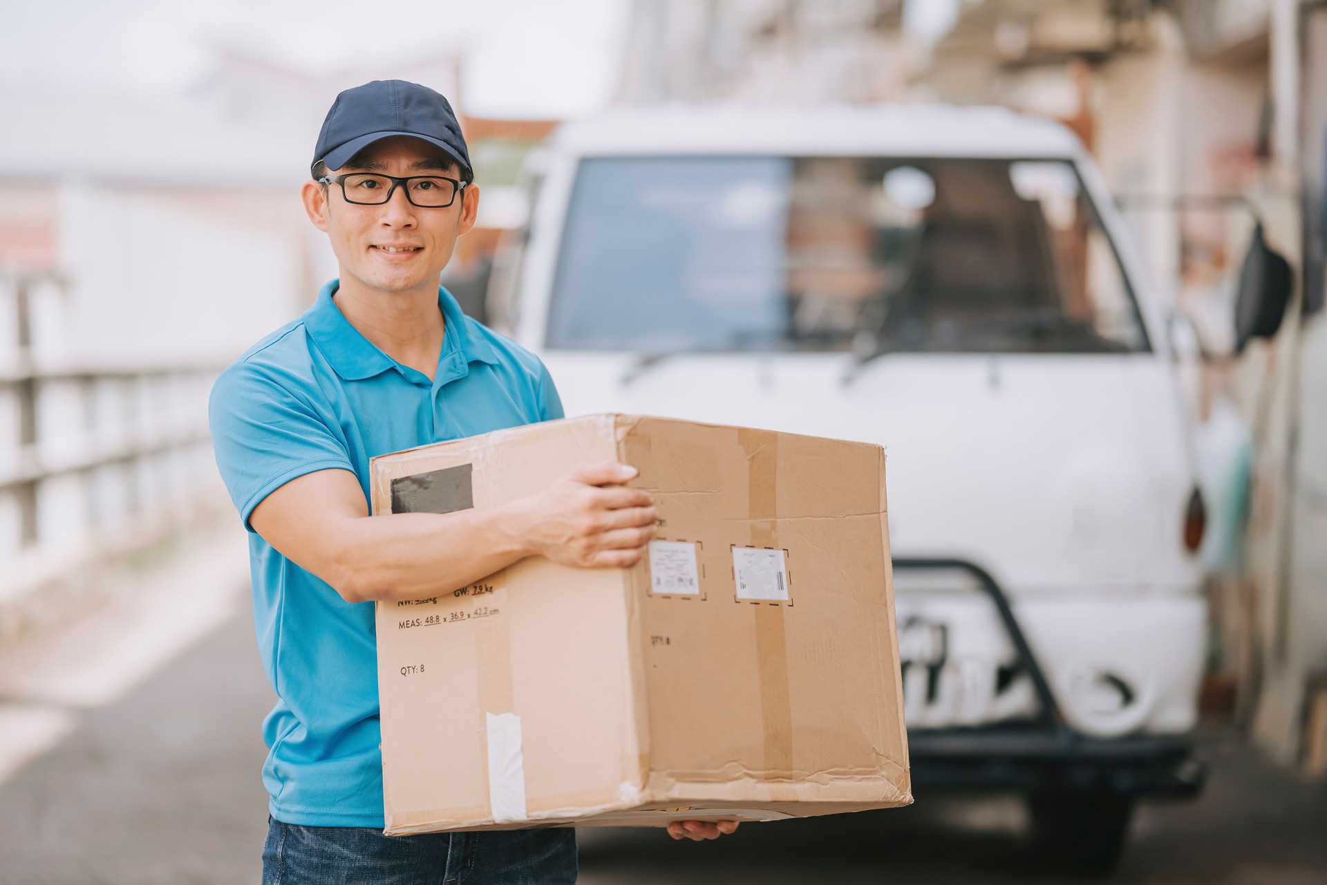 photographer portrait of man holding photo camera record of images